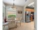 Charming dining area features a breakfast nook that is adjacent to the kitchen at 722 Portofino Dr, Kissimmee, FL 34759