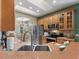 Bright kitchen with stainless steel appliances, eat in breakfast nook, and a skylight at 722 Portofino Dr, Kissimmee, FL 34759