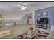 Spacious bonus room with plush carpeting, ceiling fan, and a large TV at 723 Allison Ave, Davenport, FL 33897