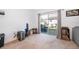 Bright living room with sliding glass doors leading to the backyard at 728 Madison Dr, Davenport, FL 33837