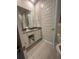 Well-lit bathroom featuring modern sink, vanity, and fixtures at 7740 Sandy Ridge Dr # 1, Kissimmee, FL 34744