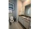 Stylish bathroom with modern vanity, ample storage and clean lines at 7740 Sandy Ridge Dr # 1, Kissimmee, FL 34744