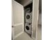 Convenient laundry closet with stacked washer and dryer units at 7740 Sandy Ridge Dr # 1, Kissimmee, FL 34744