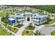 Aerial view showcasing the community amenities including a pool, playground, and meticulously maintained landscaping at 7793 Clove Hitch Way, Orlando, FL 32832