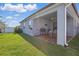 Inviting backyard patio with comfortable outdoor seating, great for entertaining or relaxing at 7793 Clove Hitch Way, Orlando, FL 32832