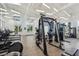 Bright and modern gym equipped with various fitness machines and ample workout space at 7793 Clove Hitch Way, Orlando, FL 32832
