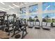 Bright fitness center with treadmills, weights, and ample space for a varied workout routine at 7793 Clove Hitch Way, Orlando, FL 32832