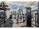 Well-equipped fitness center with modern exercise machines and weights for a complete workout experience at 7793 Clove Hitch Way, Orlando, FL 32832