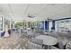 A spacious patio area with plenty of seating and ceiling fans for comfort at 7793 Clove Hitch Way, Orlando, FL 32832