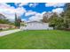 A home with a well-maintained lawn and a covered front porch at 790 Park Ln, Kissimmee, FL 34741