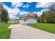 Home with a covered front porch and a long driveway at 790 Park Ln, Kissimmee, FL 34741