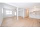Bright living room with a ceiling fan, wood-look floors, and an open concept at 790 Park Ln, Kissimmee, FL 34741