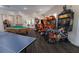 A clubhouse game room with games, billiard table and seating at 8204 Fan Palm Way, Kissimmee, FL 34747
