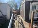 This exterior shot shows a small deck and walkway between two buildings at 731 Trenton Rd, Lakeland, FL 33815