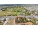 Desirable property aerial view near golf course, offering space and landscaping potential at 10538 Clarcona Ocoee Rd, Apopka, FL 32703