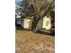 Cozy home exterior with mature tree coverage offering ample shade at 10538 Clarcona Ocoee Rd, Apopka, FL 32703