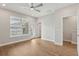 Spacious bedroom with modern ceiling fan, and bright windows at 117 E Concord St # 8, Orlando, FL 32801