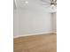 Spacious living room featuring hardwood floors and a modern ceiling fan at 117 E Concord St # 8, Orlando, FL 32801