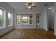 Bedroom with hardwood floors and large windows at 13041 Gabor Ave, Orlando, FL 32827