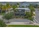 Modern commercial building exterior with sleek design, lush landscaping, and convenient street access at 13041 Gabor Ave, Orlando, FL 32827