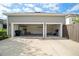 Two-car garage with open doors and ample space for parking and storage at 13041 Gabor Ave, Orlando, FL 32827