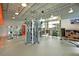 Bright gym featuring modern exercise equipment, weights, large windows, and ample workout space at 13041 Gabor Ave, Orlando, FL 32827