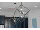 Contemporary kitchen featuring unique lighting fixtures and premium speakers at 13041 Gabor Ave, Orlando, FL 32827