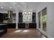 Kitchen area with wine fridge and custom cabinets at 13041 Gabor Ave, Orlando, FL 32827