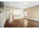 Living room featuring wood flooring, neutral paint and natural light at 13041 Gabor Ave, Orlando, FL 32827
