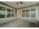 Outdoor seating area with pavers, windows and an open doorway at 13041 Gabor Ave, Orlando, FL 32827