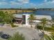 Aerial shot of Canvas Restaurant with palm trees and nearby lakeside views at 13041 Gabor Ave, Orlando, FL 32827