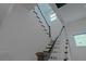 View of staircase with white and dark wood leading to the second floor at 13041 Gabor Ave, Orlando, FL 32827