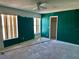 Spacious bedroom with natural light from two windows and a ceiling fan at 1322 Aguacate Ct, Orlando, FL 32837