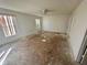 A bedroom with window and carpet removed, ready for renovations at 1322 Aguacate Ct, Orlando, FL 32837