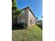 Home's exterior showcases a well-maintained lawn at 1322 Aguacate Ct, Orlando, FL 32837
