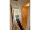 Hallway leading to a laundry room with a door, awaiting flooring and paint at 1322 Aguacate Ct, Orlando, FL 32837