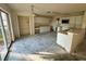 Open kitchen with white cabinets, a functional layout, and sliding glass doors to the yard at 1322 Aguacate Ct, Orlando, FL 32837