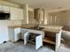 Kitchen area with double basin sink, breakfast bar, and open access to other living areas at 1322 Aguacate Ct, Orlando, FL 32837