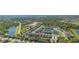 Beautiful aerial view of the neighborhood showcasing pond, landscaping and modern homes at 14321 Wabasso Loop, Winter Garden, FL 34787