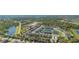 Beautiful aerial view of a community with lush landscaping and ponds at 14321 Wabasso Loop, Winter Garden, FL 34787