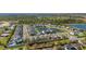 Gorgeous aerial showcasing a community near a horse farm, featuring homes, and tranquil ponds at 14321 Wabasso Loop, Winter Garden, FL 34787
