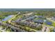 A high angle view of the community, highlighting manicured landscaping and neighborhood ponds at 14321 Wabasso Loop, Winter Garden, FL 34787