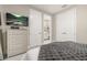 Bedroom with attached ensuite bathroom access and closet, featuring neutral walls and decor at 14321 Wabasso Loop, Winter Garden, FL 34787