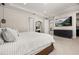 Modern bedroom featuring recessed lighting, neutral walls, a TV, and neutral decor at 14321 Wabasso Loop, Winter Garden, FL 34787