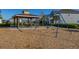 Community pavilion and playground with swings, perfect for families at 14321 Wabasso Loop, Winter Garden, FL 34787