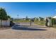 View of the gated entrance to a well-manicured Tilden Place at Winter Garden community at 14321 Wabasso Loop, Winter Garden, FL 34787