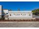 The Tilden Place at Winter Garden community sign with stone and brick base at 14321 Wabasso Loop, Winter Garden, FL 34787