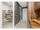 Walk-in pantry with ample shelving for organized storage, plus a small hallway at 14321 Wabasso Loop, Winter Garden, FL 34787