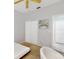 This bedroom features a ceiling fan and a closet, with an ensuite bathroom at 1718 Golfview Dr, Kissimmee, FL 34746