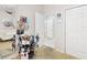 This room features a salon set-up with white sofa and stylist cart at 1718 Golfview Dr, Kissimmee, FL 34746